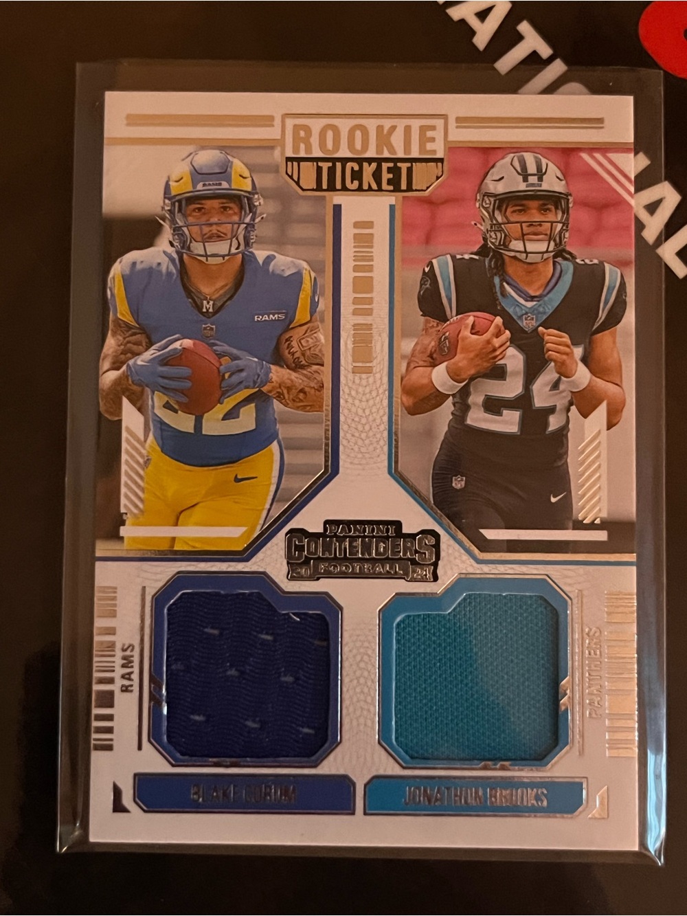 Blake Corum/ Jonathan Brooks 2024 Contenders Rookie Ticket dual patch